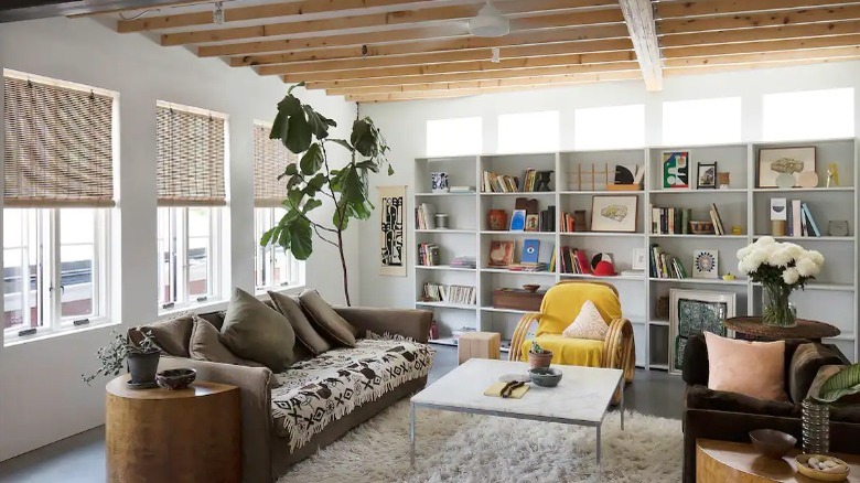 living room with exposed beam ceiling