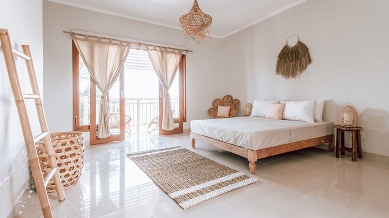 white bedroom with wood accents