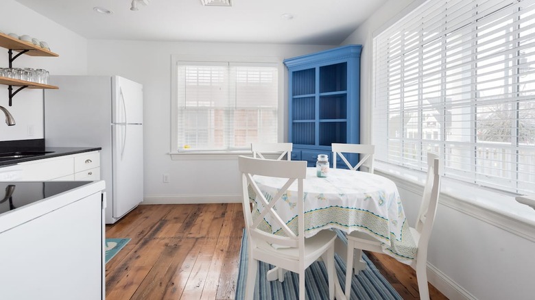 white kitchen and dining table