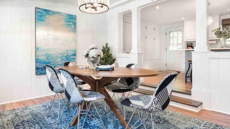 dining room with blue rug