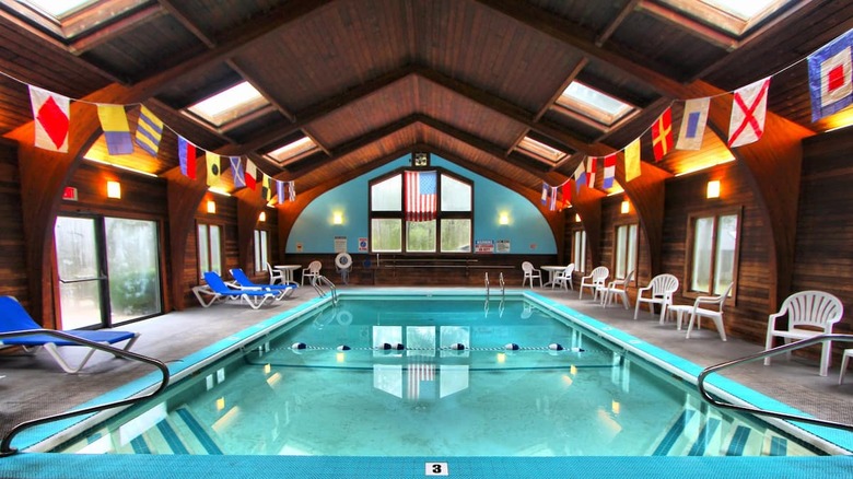 large indoor pool with flags 