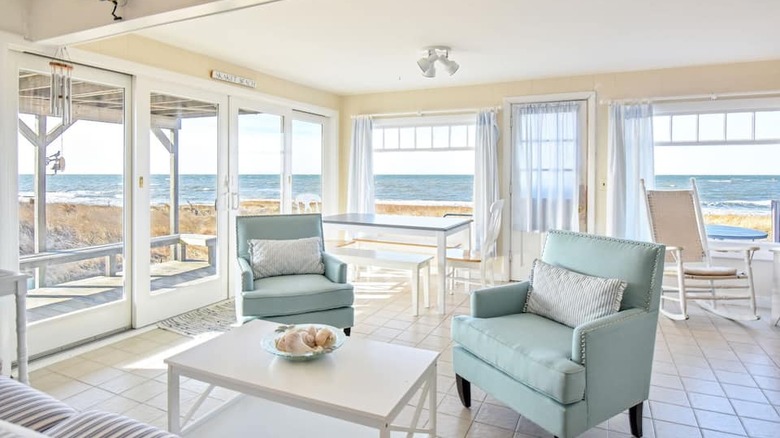 bright living room with ocean view