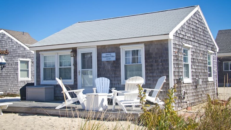 grey cottage on the sand