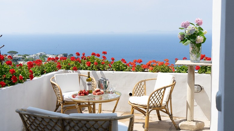 bistro table on patio overlooking ocean