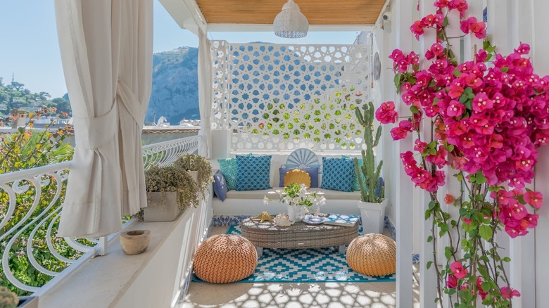 seating area with pink flowers