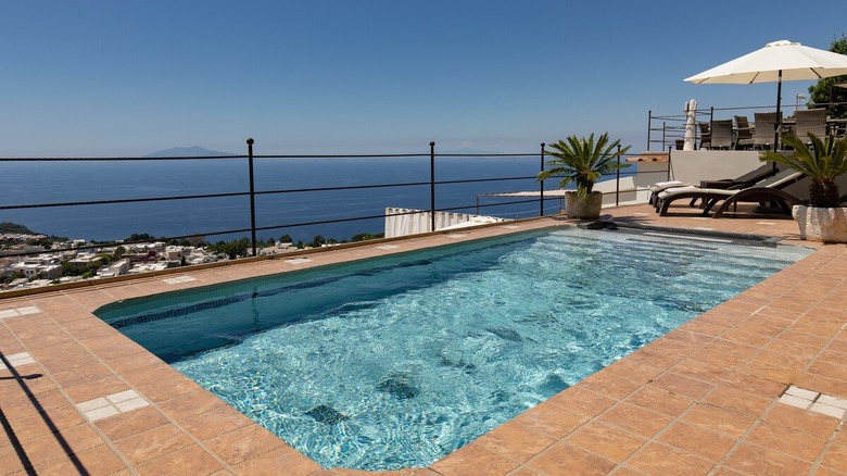 swimming pool overlooking ocean
