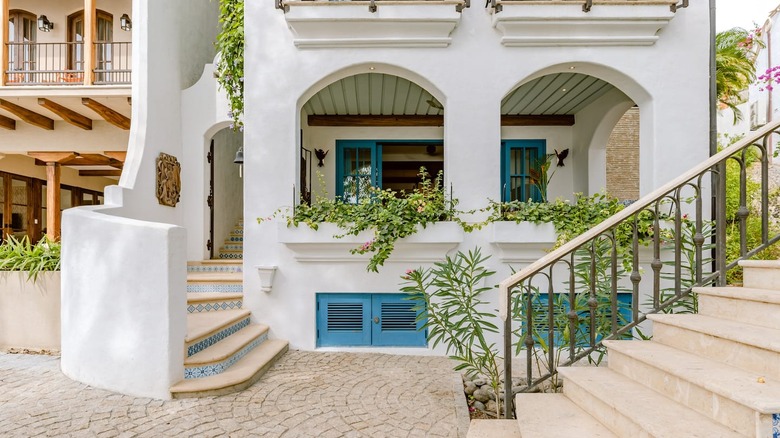 white entrance with blue accents