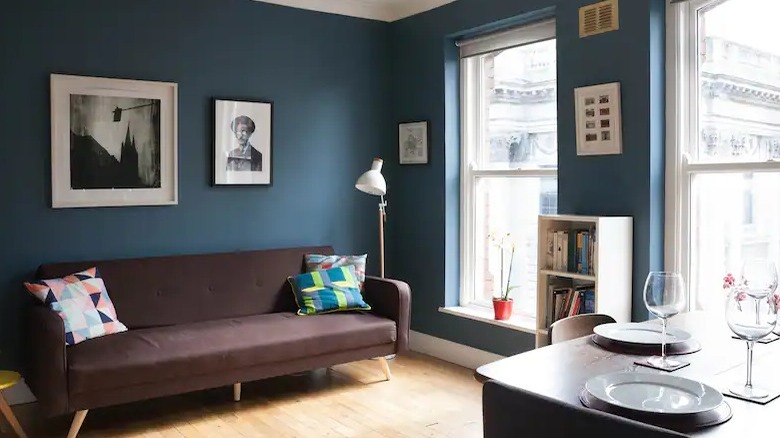 modern living room navy walls