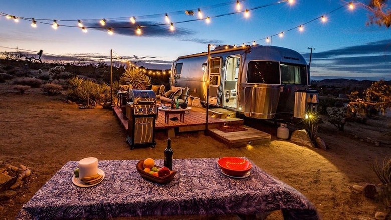 Airstream at sunset twinkling lights