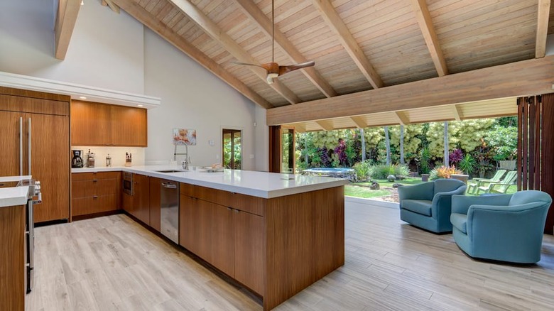 modern kitchen with blue chairs 