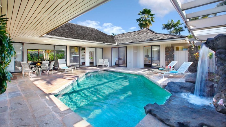 backyard with waterfall and pool