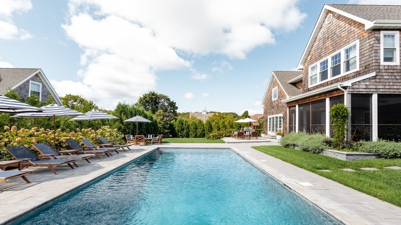 pool deck with lounge chairs