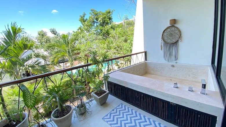 outdoor jacuzzi on a balcony