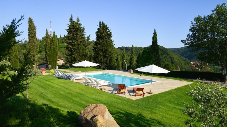 swimming pool with lounge chairs 