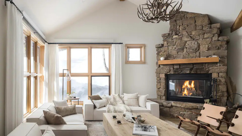 white living room stone fireplace