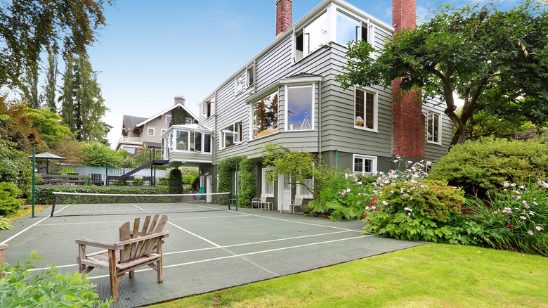 Home with backyard tennis court