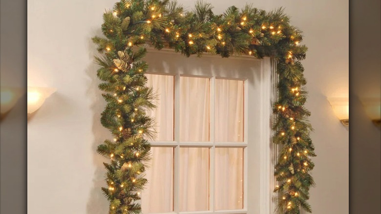 garland with pinecones over door 