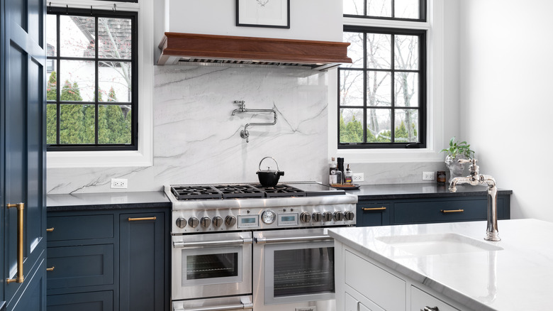 Kitchen with granite backsplash