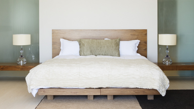 symmetrical bedroom with side lamps