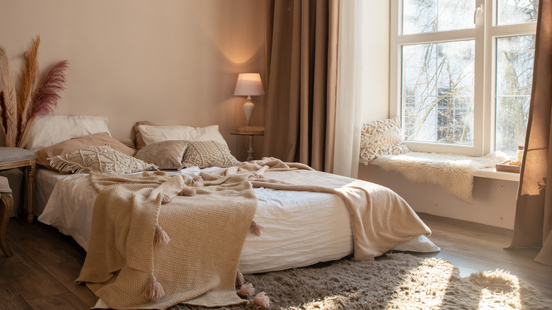 neutral bedroom with window seat