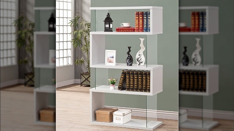 white snaking bookcase