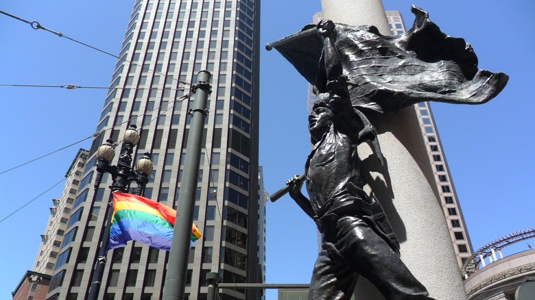 san francisco pride flag and statue