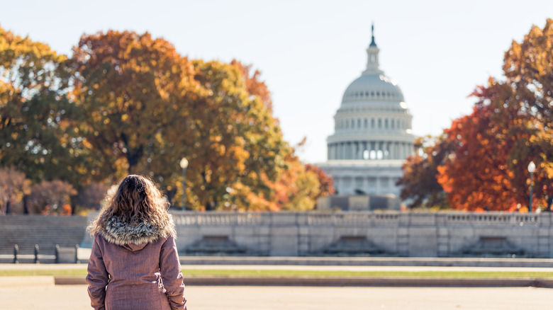 woman looking at US Capitol