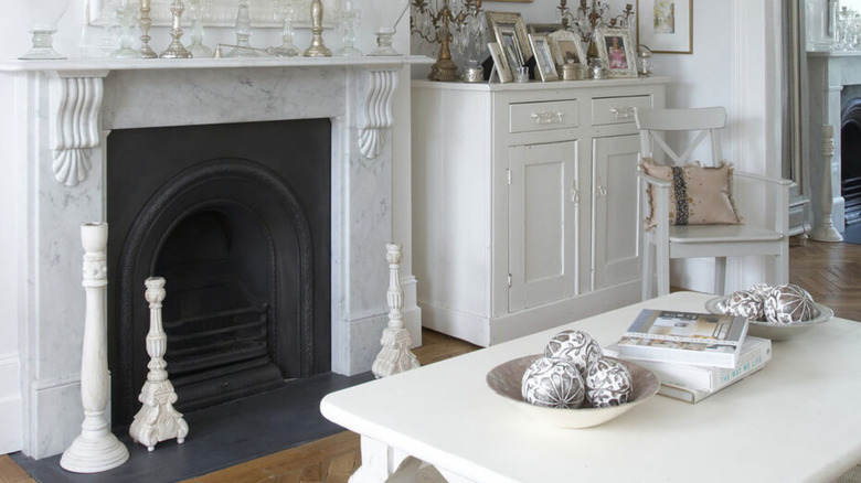 black fireplace in white room