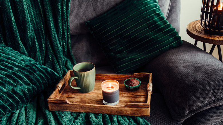 Couch with green blanket