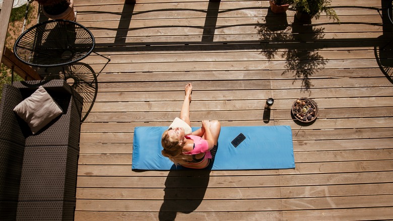 woman feeling hot on patio