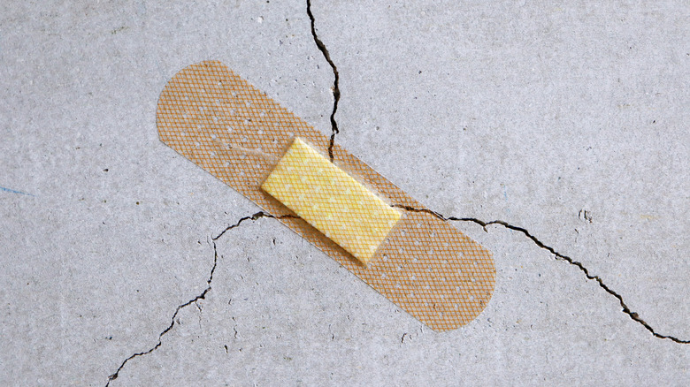 A bandaid over concrete crack