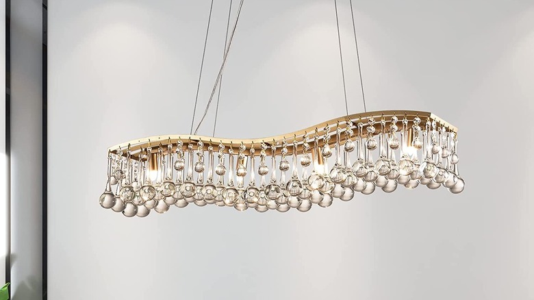 wavy chandelier with crystal bulbs