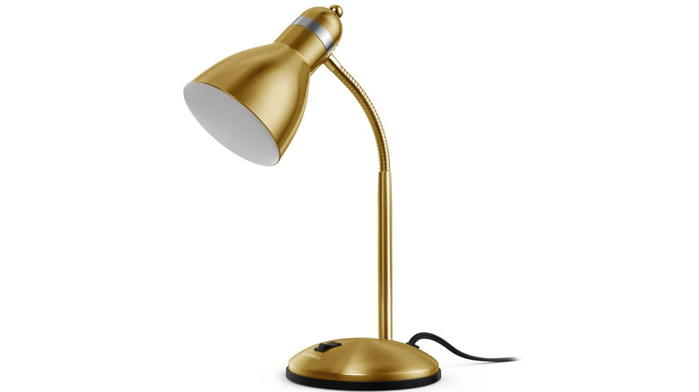 gold lamp with black switch