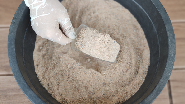 Bucket of coarse sand