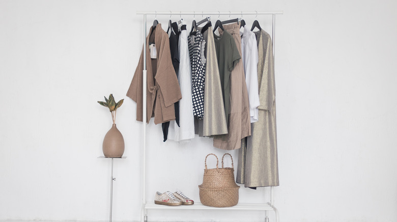 wardrobe rack with clothes