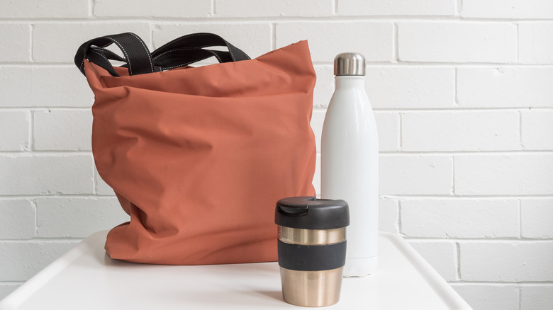 reusable coffee cup and bottle