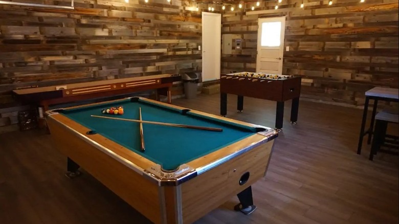 rustic game room with pool