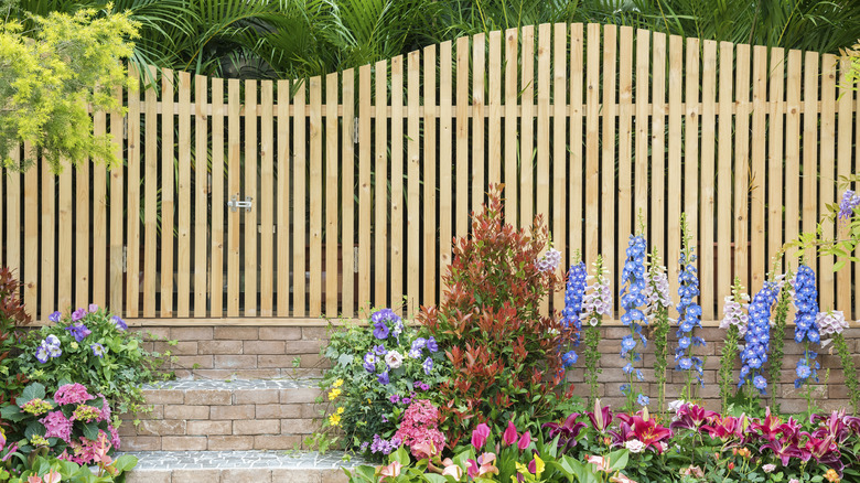 Natural wooden plank fence