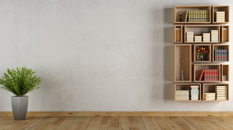 gallery wall shelving with books