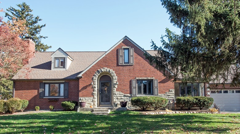 Brick house with gray door