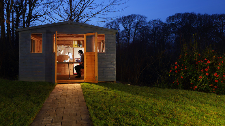 Wooden shed at night