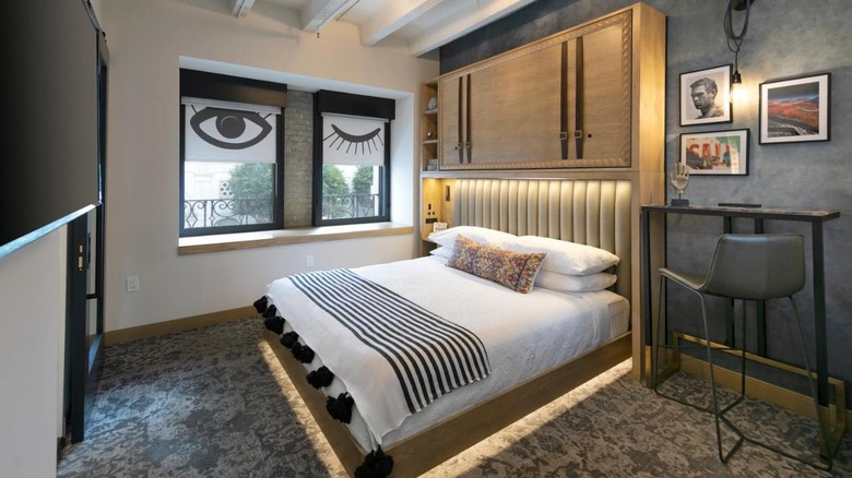 quirky hotel room with white bed