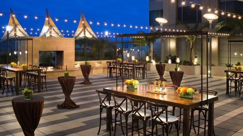 outdoor dining space with string lights