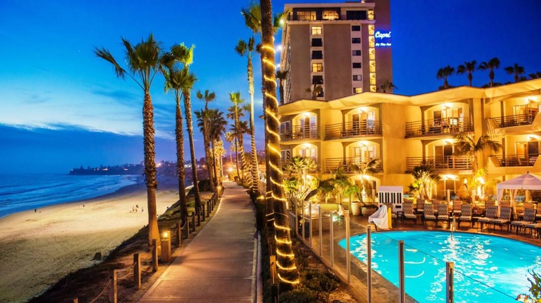 beachside pool lit up at night