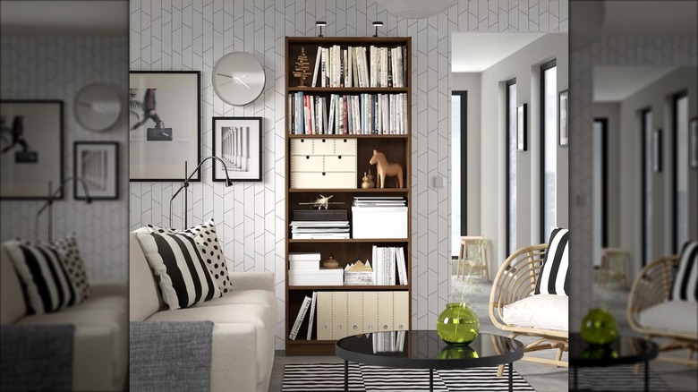 A walnut BILLY bookshelf is used in a living room