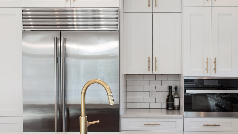 Clean white shaker cabinets in kitchen