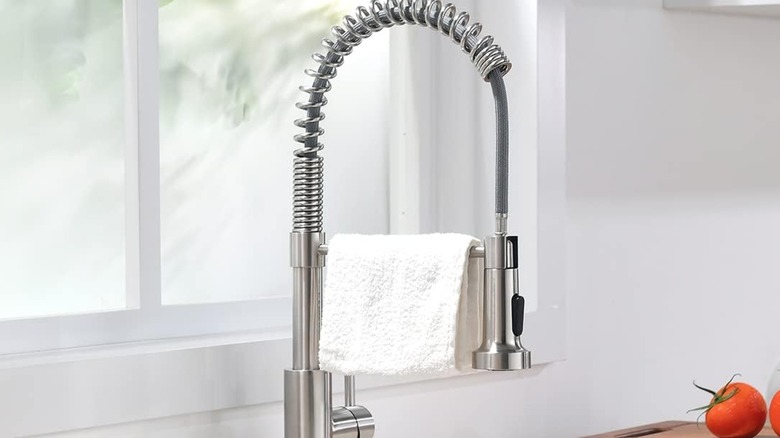 An OWOFAN faucet on a kitchen sink