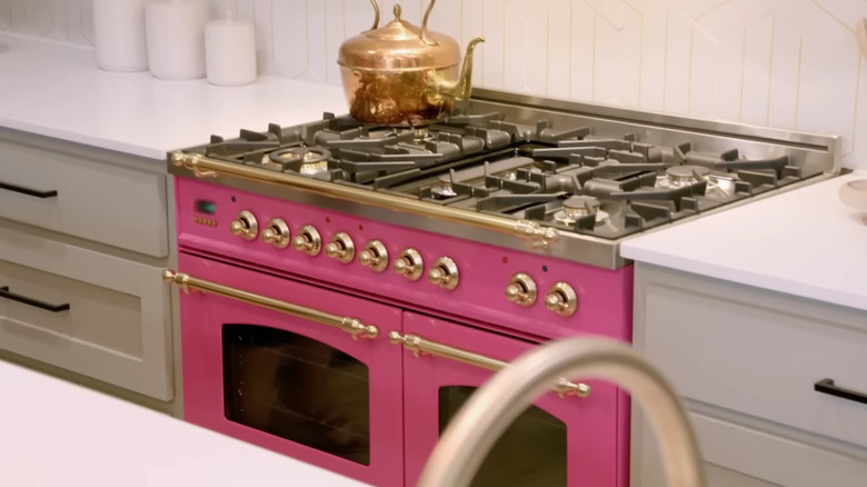 bright pink stove in neutral kitchen