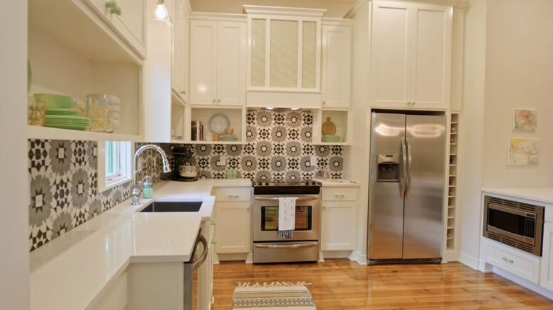 Black and white mosaic backsplash