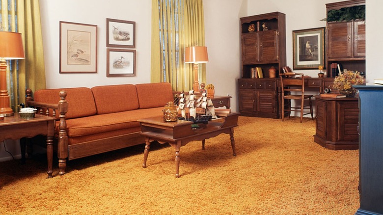 dated room with orange carpet